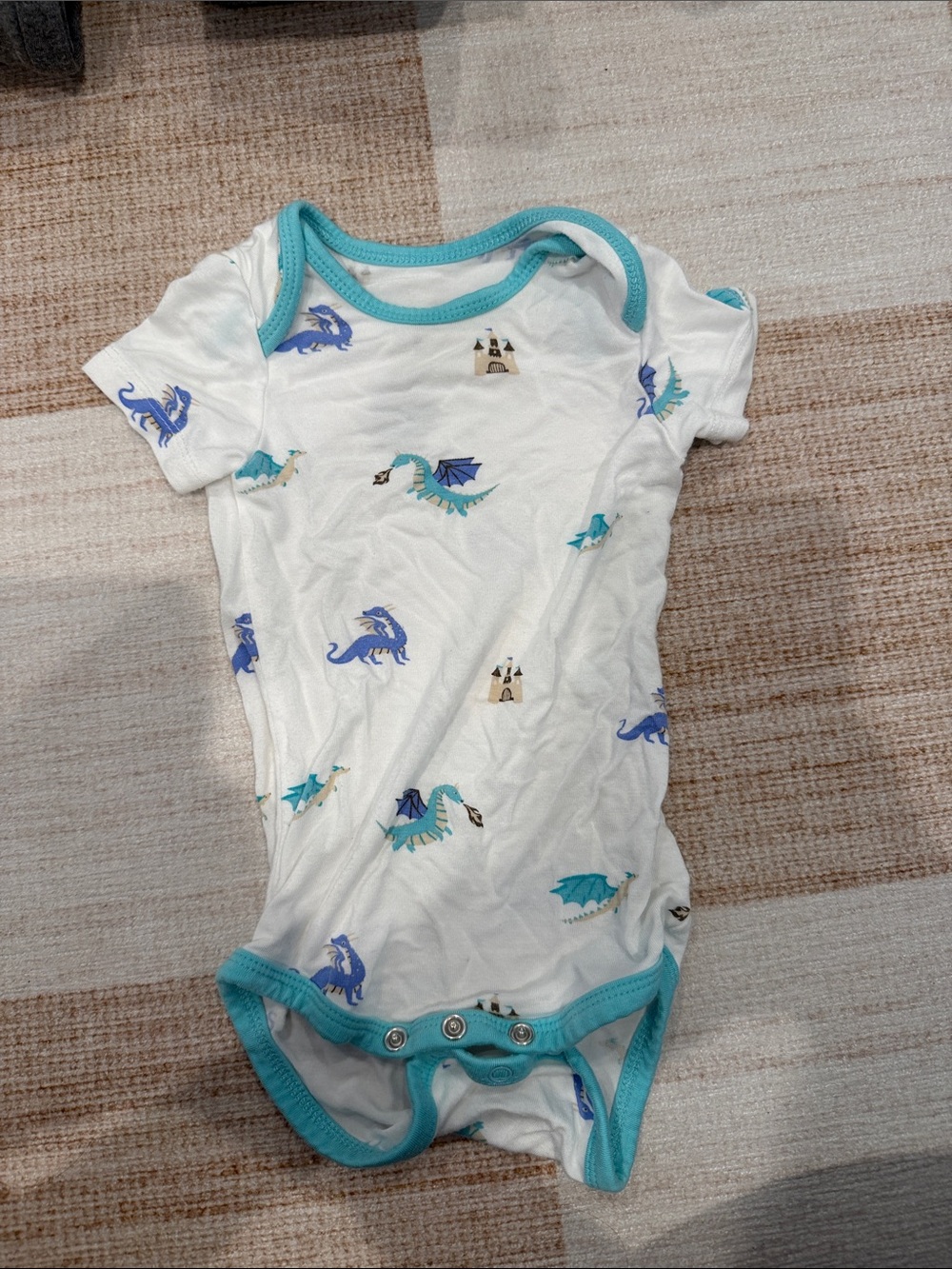Kyte BABY White Onesie with Teal Trim and Blue Accents